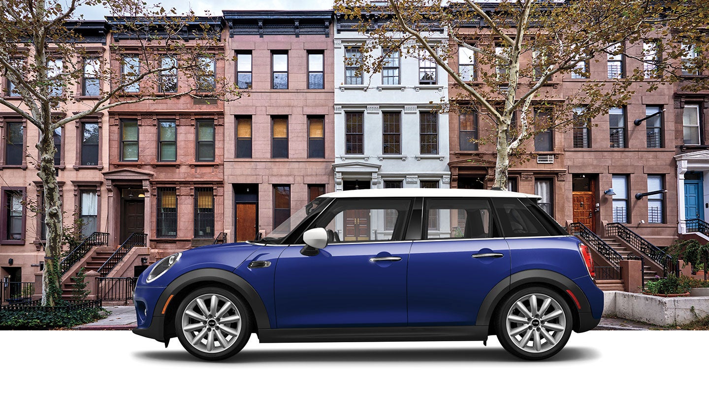  Oxford Hardtop 2 door parked in front of a residential street.