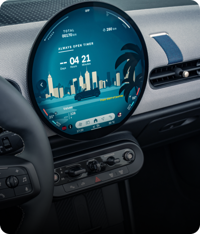 A close-up of the MINI Head-up Display with parts of the steering wheel and MINI OLED Display visible.
                        Everything you