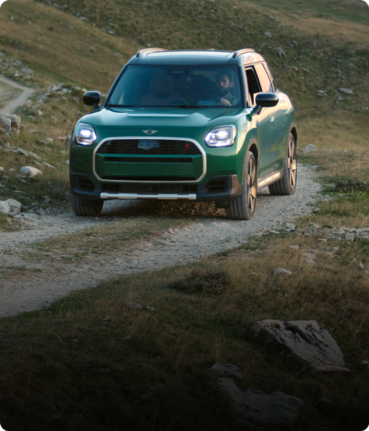 The MINI Countryman S ALL4 drives on rugged terrain