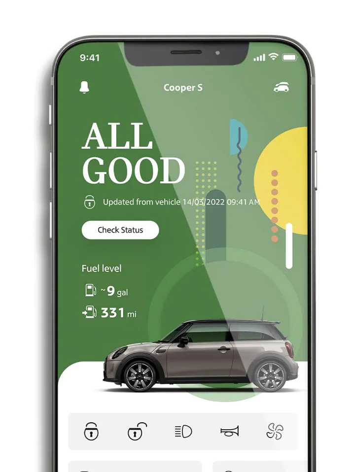 Smartphone with MINI App vehicle status information on its screen. | MINI of Alexandria in Alexandria VA